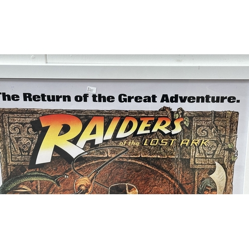 63C - Three framed reproduction prints, one Robert De Niro Taxi Driver, one Raiders of the Lost Ark and on... 