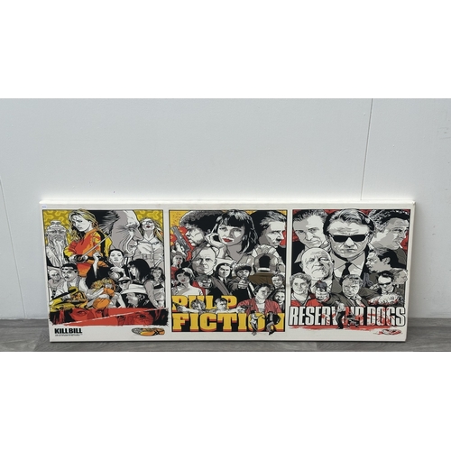 63D - Two reproduction prints, one framed Pulp Fiction poster - approx. 89cm high x 64cm wide and one canv... 