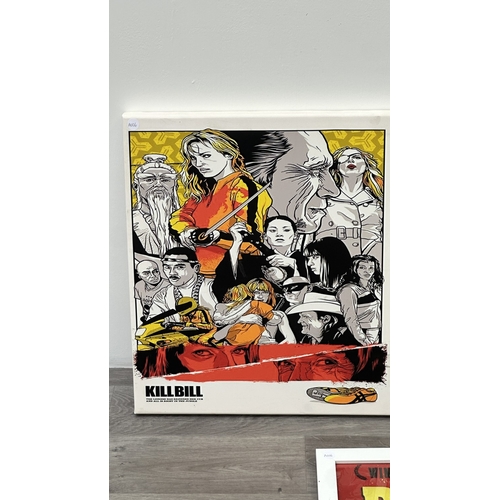 63D - Two reproduction prints, one framed Pulp Fiction poster - approx. 89cm high x 64cm wide and one canv... 