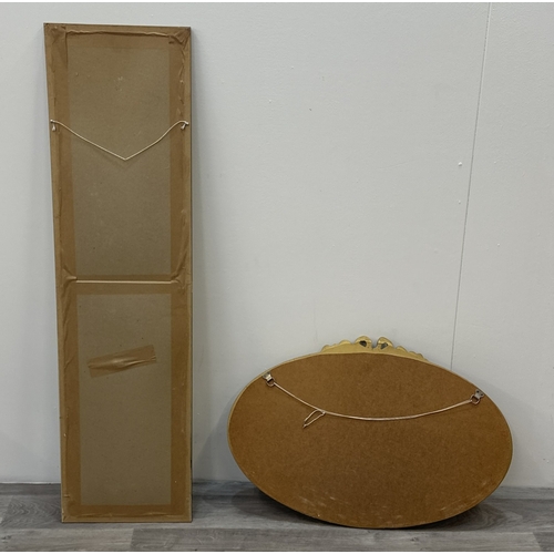 63E - Two gilt framed wall mirrors, one oval - approx. 49cm high x 71cm wide and one rectangular - approx.... 