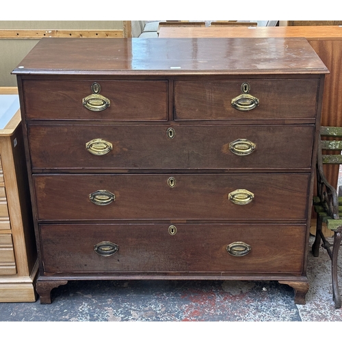 64 - A George III mahogany chest of drawers - approx. 108cm high x 120cm wide x 54cm deep