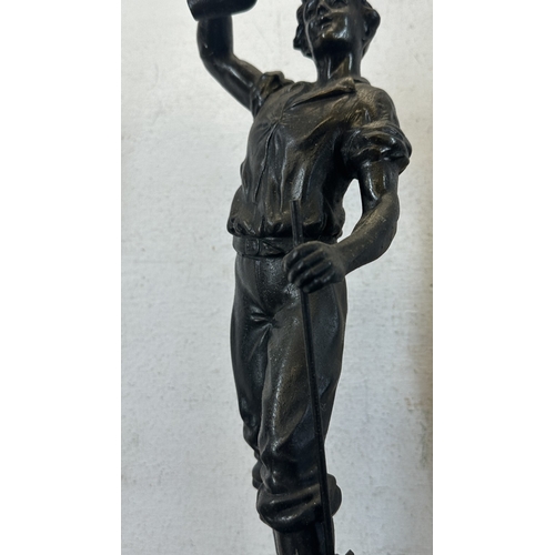 69 - Two French bronzed spelter figurines on ebonised plinths, one titled 'La Paysanne' and one titled 'L... 