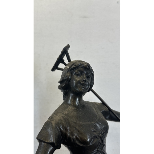 69 - Two French bronzed spelter figurines on ebonised plinths, one titled 'La Paysanne' and one titled 'L... 