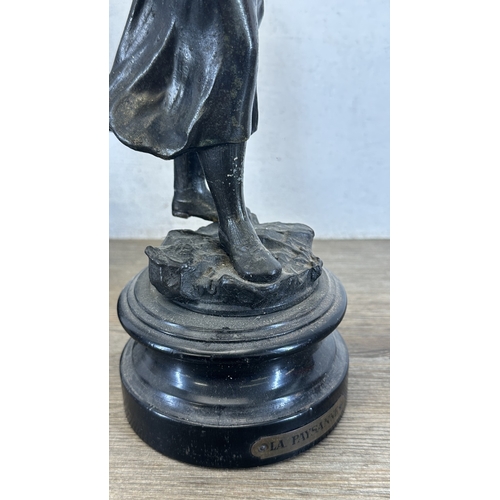 69 - Two French bronzed spelter figurines on ebonised plinths, one titled 'La Paysanne' and one titled 'L... 