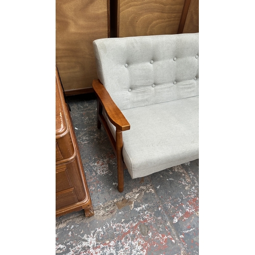 7 - A WarmieHomy grey button back fabric upholstered and stained beech two seater sofa - approx. 75cm hi... 