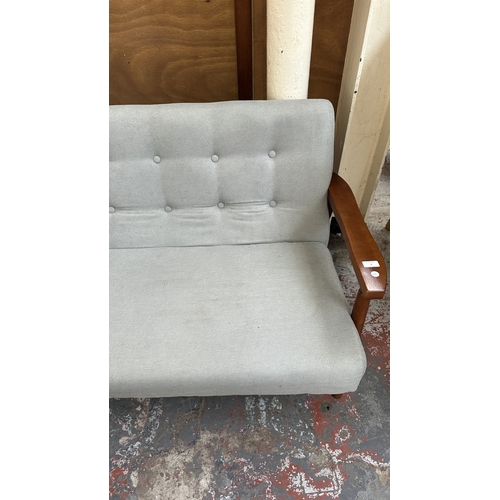 7 - A WarmieHomy grey button back fabric upholstered and stained beech two seater sofa - approx. 75cm hi... 