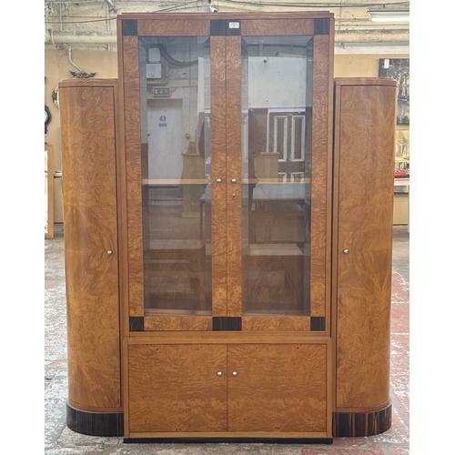 73 - An Art Deco style French walnut and rosewood effect cocktail/display cabinet - approx. 173cm high x ... 