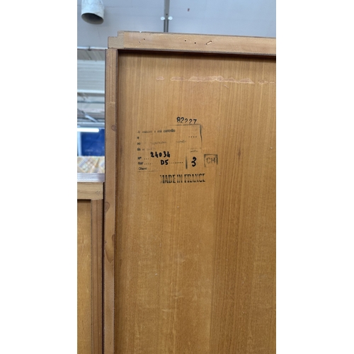 73 - An Art Deco style French walnut and rosewood effect cocktail/display cabinet - approx. 173cm high x ... 