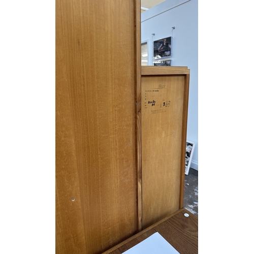 73 - An Art Deco style French walnut and rosewood effect cocktail/display cabinet - approx. 173cm high x ... 