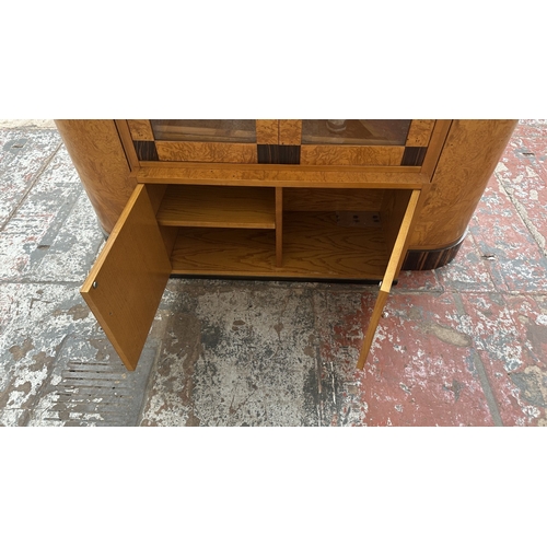 73 - An Art Deco style French walnut and rosewood effect cocktail/display cabinet - approx. 173cm high x ... 