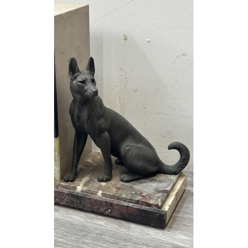 75 - An Art Deco French marble and onyx mantel clock featuring two spelter German Shepherd dog figurines ... 
