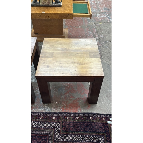 76 - A pair of modern hardwood side tables - approx. 45cm high x 60cm square