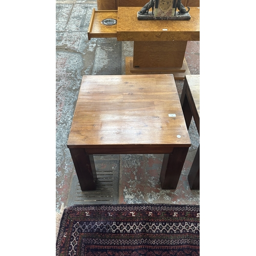 76 - A pair of modern hardwood side tables - approx. 45cm high x 60cm square