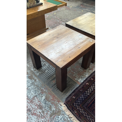 76 - A pair of modern hardwood side tables - approx. 45cm high x 60cm square
