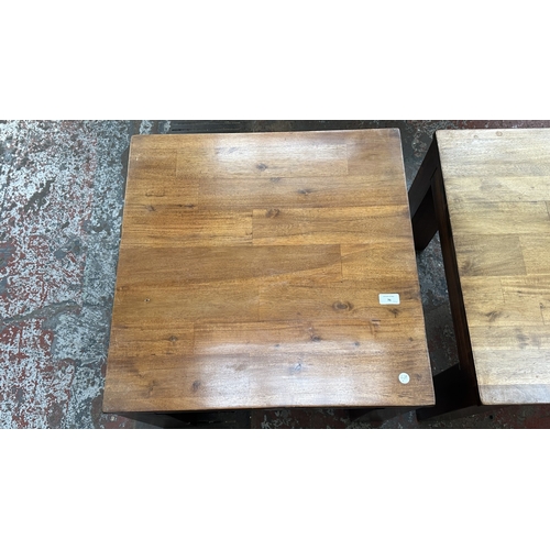 76 - A pair of modern hardwood side tables - approx. 45cm high x 60cm square