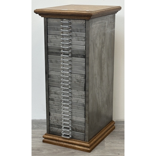 78 - A 1930s upcycled metal thirty drawer filing cabinet with later oak top and base - approx. 88cm high ... 