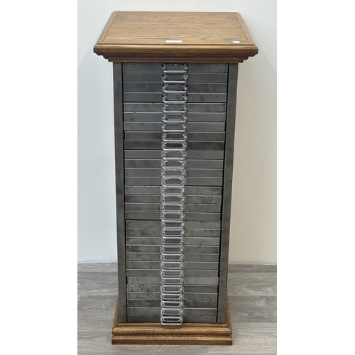 78 - A 1930s upcycled metal thirty drawer filing cabinet with later oak top and base - approx. 88cm high ... 
