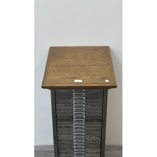 78 - A 1930s upcycled metal thirty drawer filing cabinet with later oak top and base - approx. 88cm high ... 