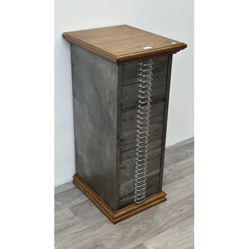 78 - A 1930s upcycled metal thirty drawer filing cabinet with later oak top and base - approx. 88cm high ... 
