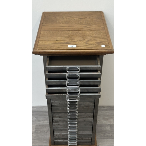 78 - A 1930s upcycled metal thirty drawer filing cabinet with later oak top and base - approx. 88cm high ... 