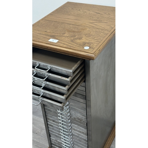 78 - A 1930s upcycled metal thirty drawer filing cabinet with later oak top and base - approx. 88cm high ... 