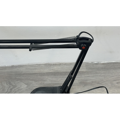 79 - A Micromark MM6824 black metal swingarm desk lamp - approx. 65cm high
