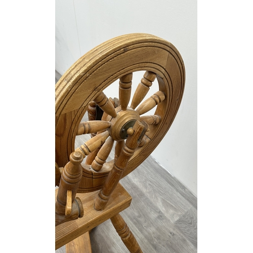 8 - A 19th century style pine spinning wheel, possibly Ashford - approx. 90cm high x 46cm wide x 70cm de... 