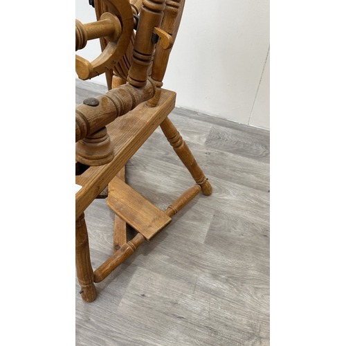 8 - A 19th century style pine spinning wheel, possibly Ashford - approx. 90cm high x 46cm wide x 70cm de... 