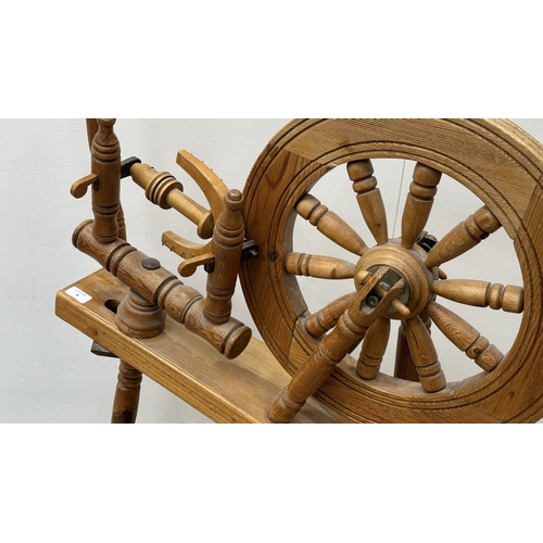 8 - A 19th century style pine spinning wheel, possibly Ashford - approx. 90cm high x 46cm wide x 70cm de... 