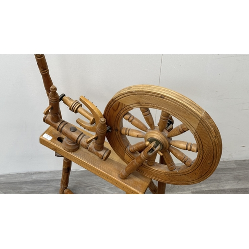 8 - A 19th century style pine spinning wheel, possibly Ashford - approx. 90cm high x 46cm wide x 70cm de... 