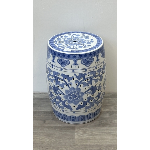 82 - A Chinese blue and white ceramic garden stool - approx. 45cm high x 30cm diameter