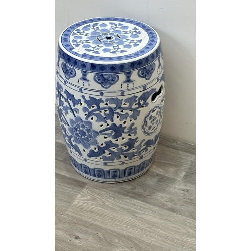 82 - A Chinese blue and white ceramic garden stool - approx. 45cm high x 30cm diameter