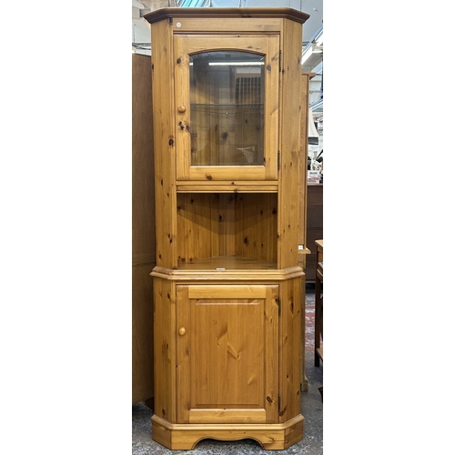 84 - A pine free standing corner display cabinet - approx. 191cm high x 71cm wide x 44cm deep