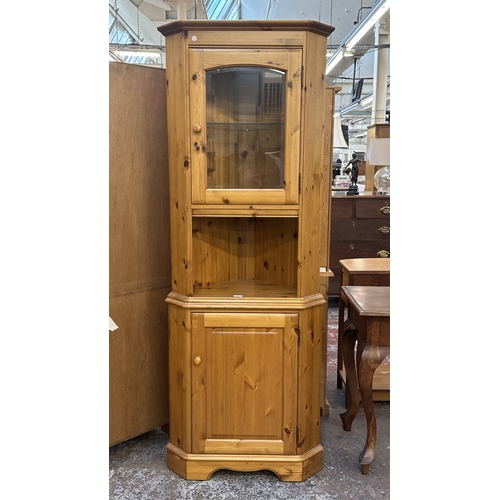 84 - A pine free standing corner display cabinet - approx. 191cm high x 71cm wide x 44cm deep