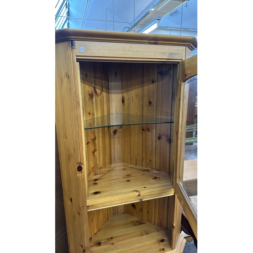 84 - A pine free standing corner display cabinet - approx. 191cm high x 71cm wide x 44cm deep