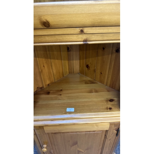 84 - A pine free standing corner display cabinet - approx. 191cm high x 71cm wide x 44cm deep