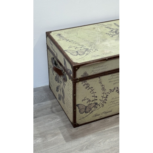 85 - A modern botanical themed fabric and brown faux leather storage chest with later rope handle to top ... 