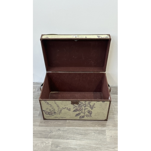 85 - A modern botanical themed fabric and brown faux leather storage chest with later rope handle to top ... 