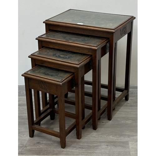 87 - A Chinese carved hardwood quartetto nest of tables - approx. 63cm high x 50cm wide x 35cm deep
