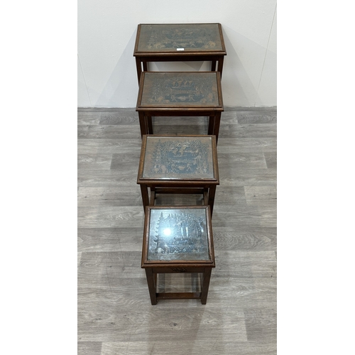 87 - A Chinese carved hardwood quartetto nest of tables - approx. 63cm high x 50cm wide x 35cm deep