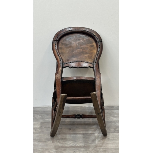 9 - A late 19th century stained beech and embossed plywood child's rocking chair - approx. 65cm high x 3... 