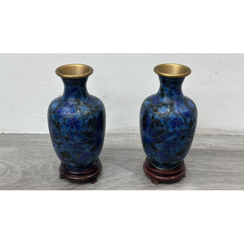 91 - A pair of Chinese cloisonné baluster vases on wooden stands - approx. 17.5cm high