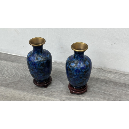 91 - A pair of Chinese cloisonné baluster vases on wooden stands - approx. 17.5cm high