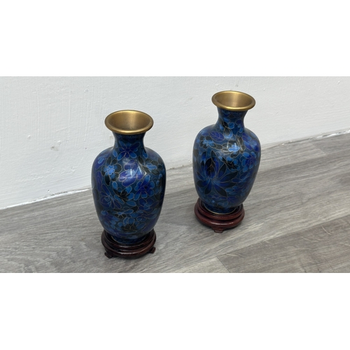 91 - A pair of Chinese cloisonné baluster vases on wooden stands - approx. 17.5cm high