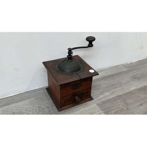 96 - An early 20th century French Peugeot Frères wood and metal coffee grinder - approx. 22cm high x 16cm... 