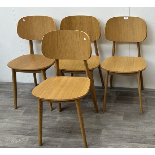 98 - Four modern oak dining chairs - approx. 83cm high x 43cm wide x 50cm deep