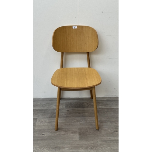 98 - Four modern oak dining chairs - approx. 83cm high x 43cm wide x 50cm deep