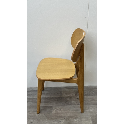 98 - Four modern oak dining chairs - approx. 83cm high x 43cm wide x 50cm deep