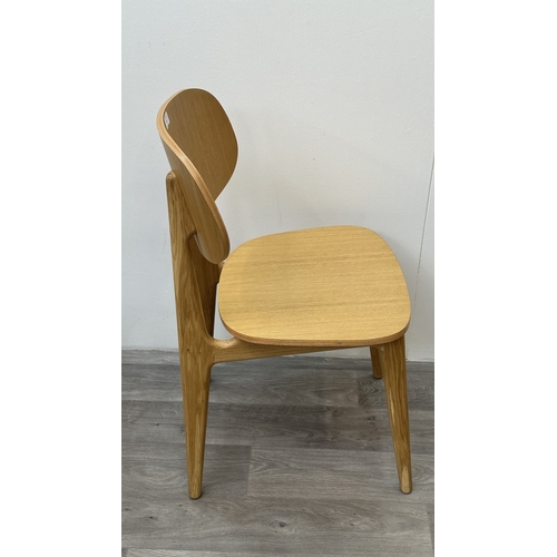 98 - Four modern oak dining chairs - approx. 83cm high x 43cm wide x 50cm deep