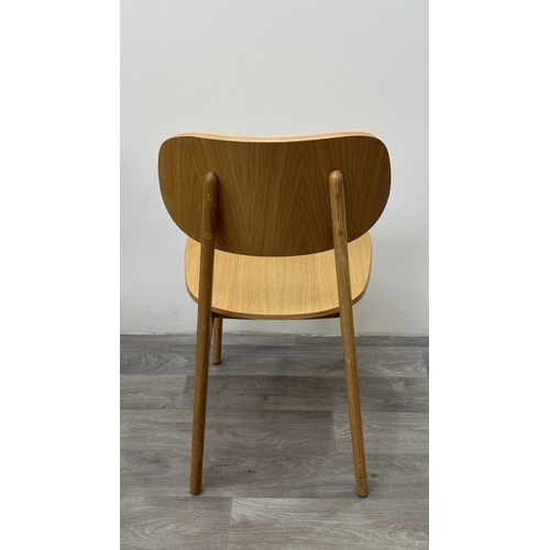 98 - Four modern oak dining chairs - approx. 83cm high x 43cm wide x 50cm deep